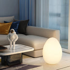 Floor Lamp | Egg-Shaped Sculptural LED & Molded Shell | Weighted Base
